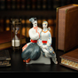 Porcelain figurine "Cossack and his sweetheart" photo