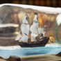 Корабль в бутылке ручной работы фото