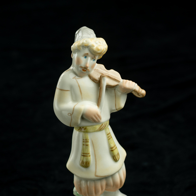 статуэтка казак играет на скрипке фото