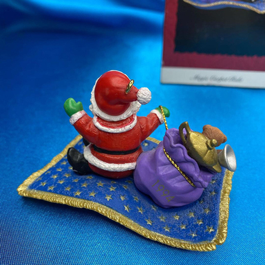 on a flying carpet on the Christmas tree photo