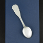 buy a baby spoon in a gift shop photo