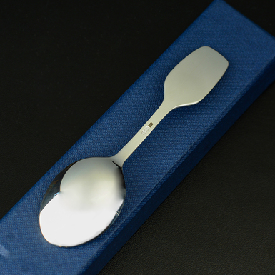buy a baby spoon in a gift shop photo