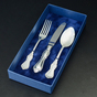 cutlery in gift wrapping photo