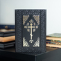 Gift book "Bible" with the symbolism of the cross on the cover photo