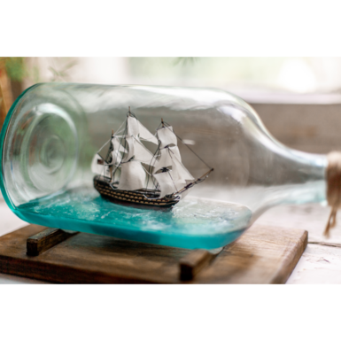 Корабль в бутылке ручной работы фото