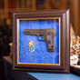 Подарочный пистолет ТТ и эмблема Национальной гвардии Украины муляж фото
