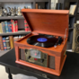 wow video Music center Lancaster Entertainment Center - Paprika by Crosley