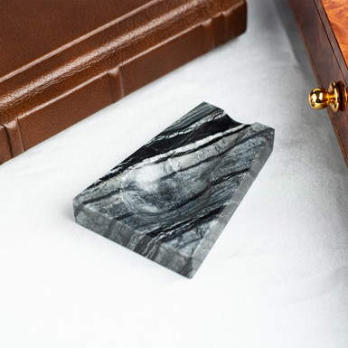 Buy an ashtray made of black and white marble