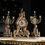 A set of bronze pendulum clock and two "Beautiful past" candelabra by Virtus photo