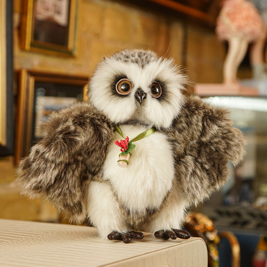 Author's artificial fur toy "Grey Owl" photo