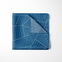 a blue striped handkerchief folded 4 times