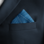 a handkerchief in a business suit