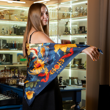 a girl with a large silk scarf