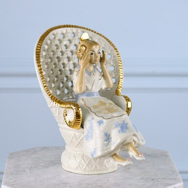 Vintage porcelain figurine "Girl in a chair", Spain photo