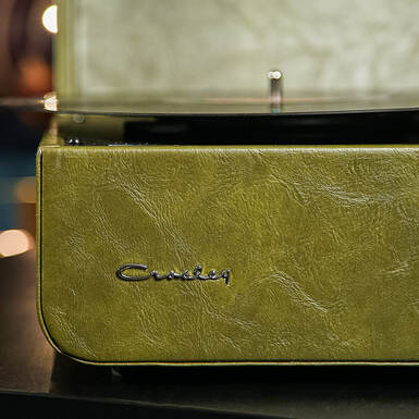 Виниловый проигрыватель "Mercury Portable Turntable Forest Green" от Crosley