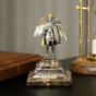 Angel statuette on a stand photo