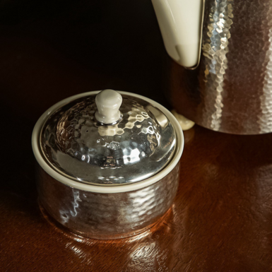 Sugar bowl in thermocapsule photo