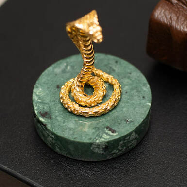 Gilded statuette "Year of the Snake" made of brass «Pandora» on a marble stand