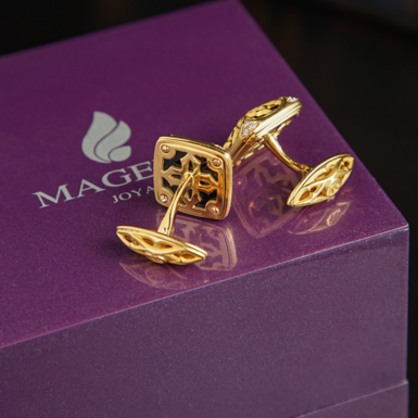 Золоті запонки з діамантами фото