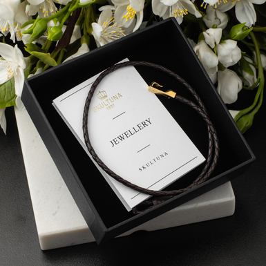 Кожаный браслет с позолоченной вставкой фото 1