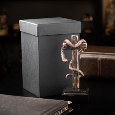 Bronze statuette on a pedestal photo