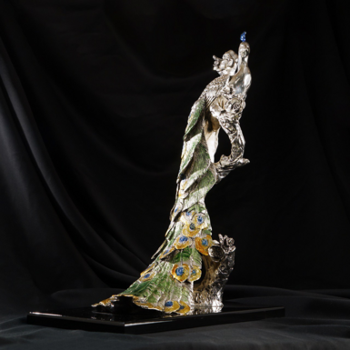 Massive figurine on a wooden stand photo