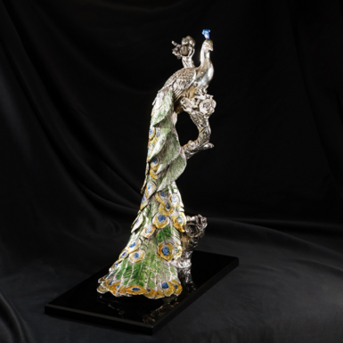 Large sculpture on a wooden stand photo