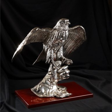 Falcon on a stand photo