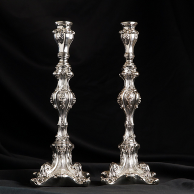 Pair of silver candlesticks photo