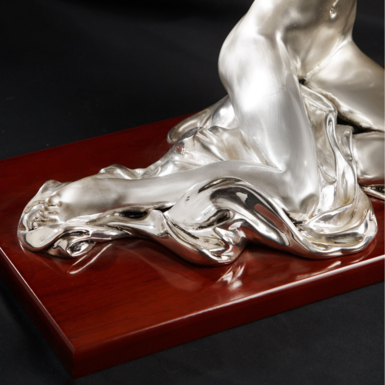 Statuette on a stand photo