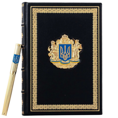 Шкіряна позолочена обкладинка фото