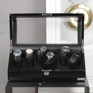 пристрій для підзаводу годинника фото