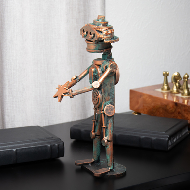 статуетка з металу фото