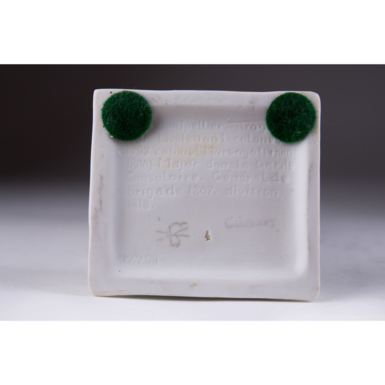 Bottom of the statuette with a short biography photo