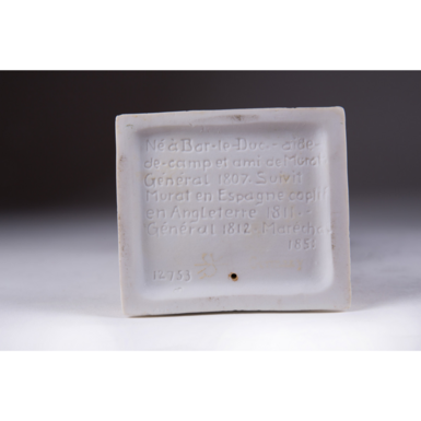 Bottom of the third statue with a biography photo