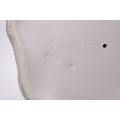 Оттиск на обратной стороне статуэтки фото