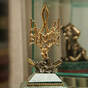 Позолочена статуетка фото