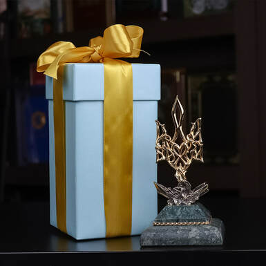 Подарункова упаковка статуетки фото
