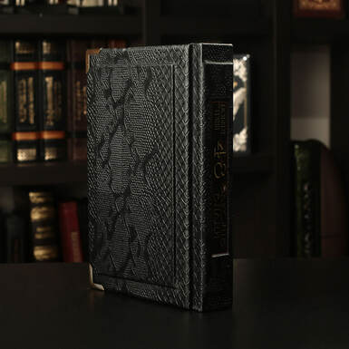 Зворотній бік книги в чорному кольорі фото