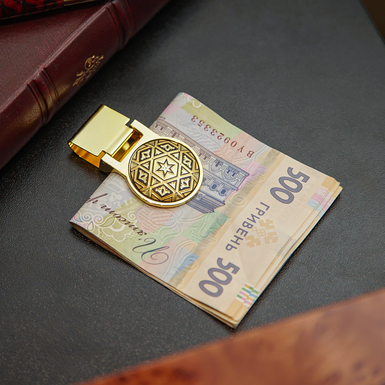 Зажим в действии фото