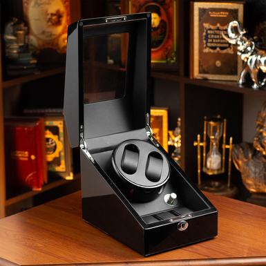 Відкрита скринька для годинників фото