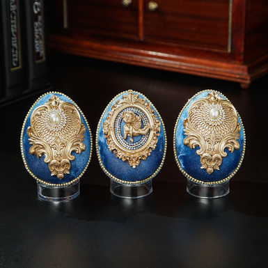 Three eggs on a stand photo