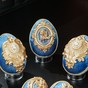 Blue clay eggs in velvet photo