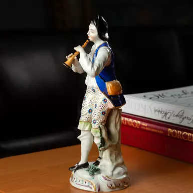 wow video Rare porcelain figurine of the early 20th century "Boy with a flute"