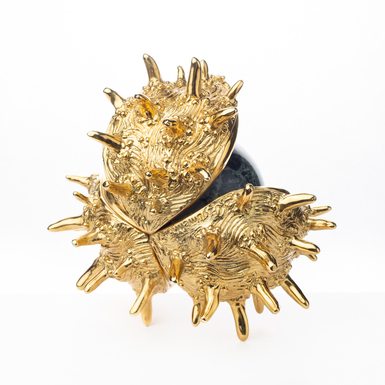 золотая статуэтка каштан фото 1