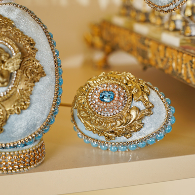 Egg inlaid with beads photo