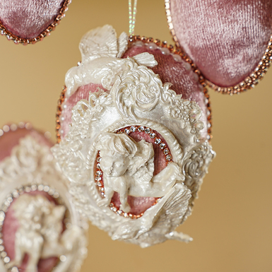 Angel figurine on easter egg photo