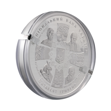 монета у футлярі фото