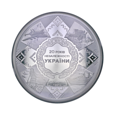 Срібна монета фото