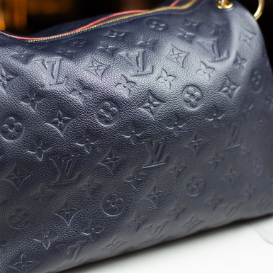 Оригінальний логотип Louis Vuitton фото